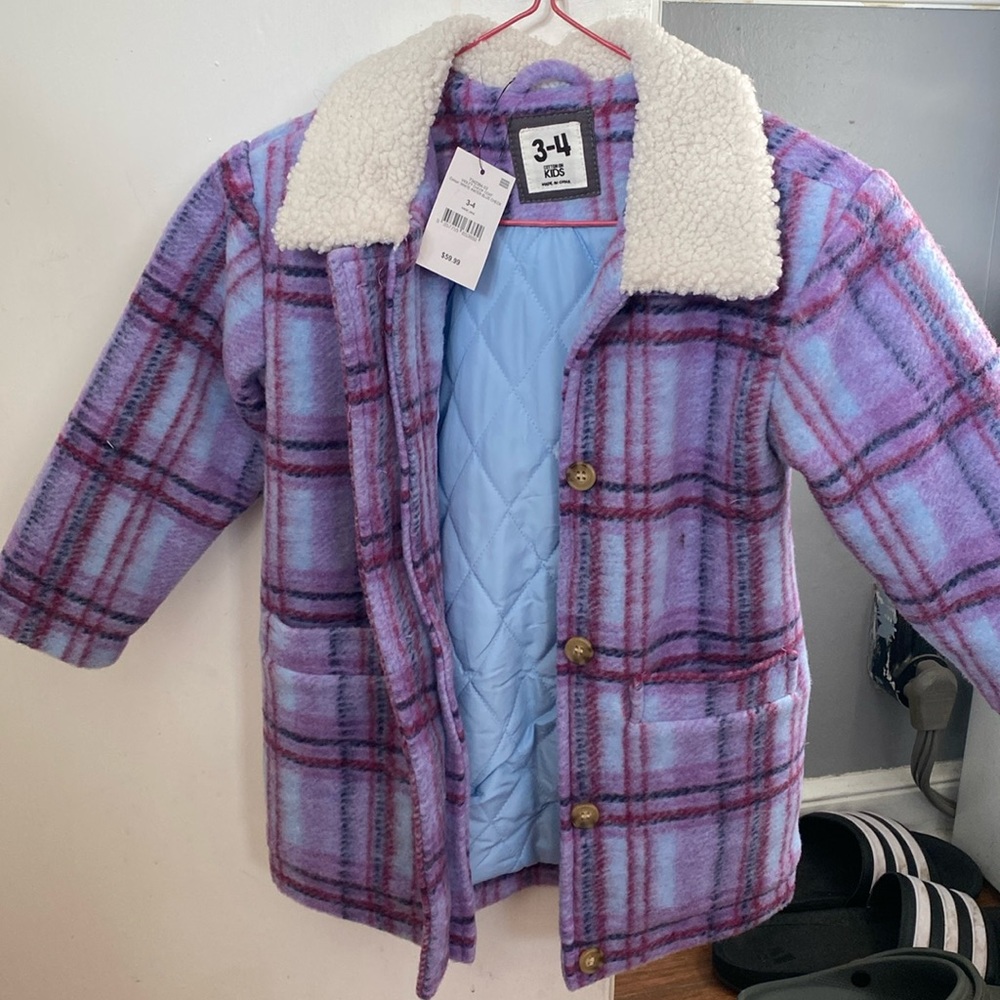 Never worn with tags still on Cotton on kids jacket!